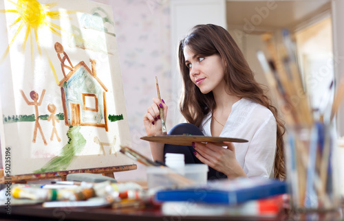 Photo: Woman paints home of dreams Woman paints home of dreams