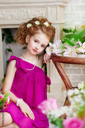 Photo: Portrait of a beautiful girl with flowers Portrait of a beautiful girl with flowers