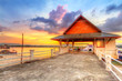 Foto: Sunrise at the harbor of Koh Kho Khao island, Thailand Sunrise at the harbor of Koh Kho Khao island, Thailand