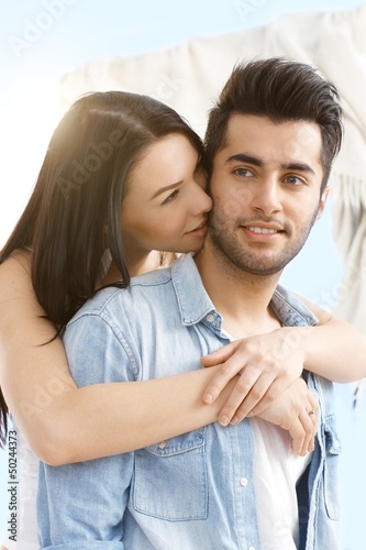 Photo: Loving couple embracing outdoor Loving couple embracing outdoor