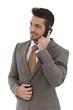 Young businessman on mobile