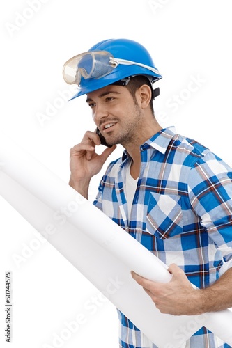 Photo: Young architect busy by working Young architect busy by working