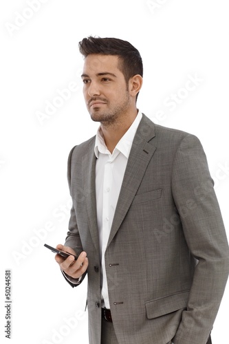 Photo: Young businessman with mobile Young businessman with mobile