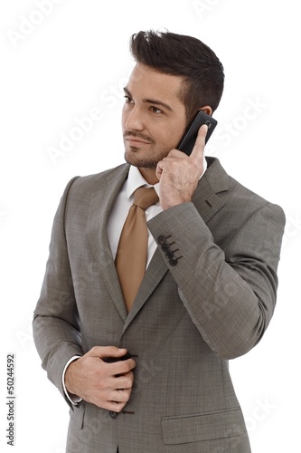 Photo: Young businessman on mobile Young businessman on mobile