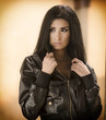 Beautiful woman wearing leather jacket