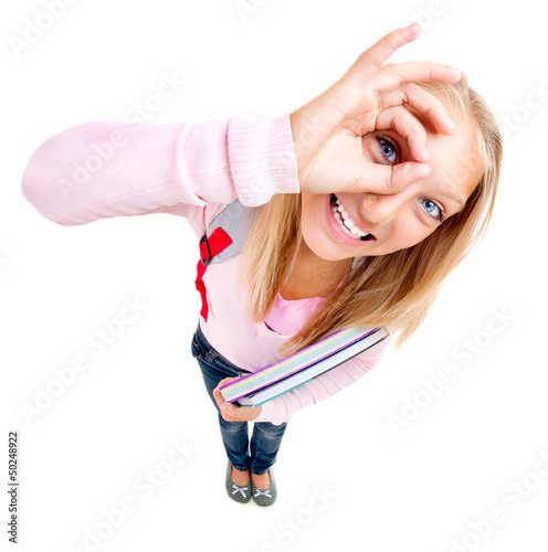 Photo: Funny Schoolgirl or Student over white Funny Schoolgirl or Student over white