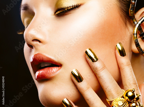 Photo: Fashion Beauty. Manicure and Make-up Fashion Beauty. Manicure and Make-up