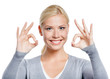 Portrait of woman okay gesturing with two hand