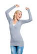 Half-length portrait of female with her fists up, isolated