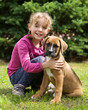 Portrait of little girl with her dog