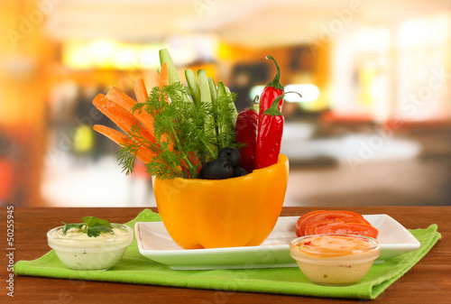 Photo: Assorted raw vegetables sticks in pepper bowl Assorted raw vegetables sticks in pepper bowl