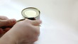 Video: Man opening metal can with tomato sauce with vintage key Man opening metal can with tomato sauce with vintage key