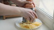 Video: Man grating cheese for pizza, timelapse Man grating cheese for pizza, timelapse