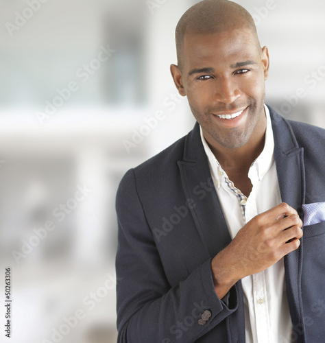 Photo: Happy businessman smiling Happy businessman smiling
