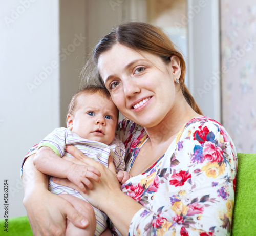 Photo: Happy mother with 3 month daughter Happy mother with 3 month daughter