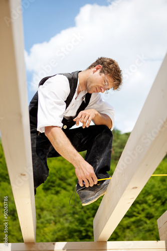 Photo: zimmermann misst nach zimmermann misst nach