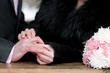 Newly-married couple on wedding dresses gold rings