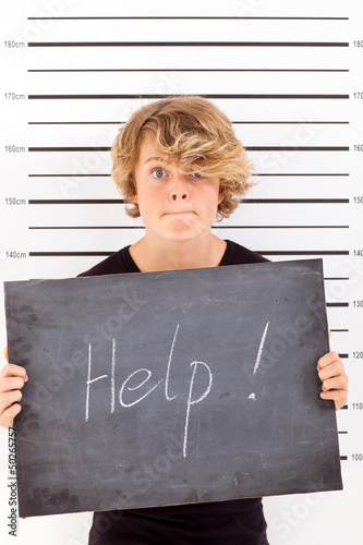 Photo: teen in trouble with law crying for help teen in trouble with law crying for help