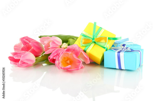 Photo: Pink tulips and gift boxes, isolated on white Pink tulips and gift boxes, isolated on white
