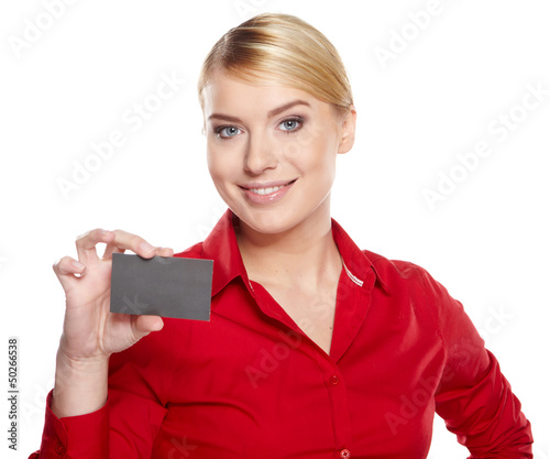 Photo: Businesswoman holding credit card. Isolated on white Businesswoman holding credit card. Isolated on white