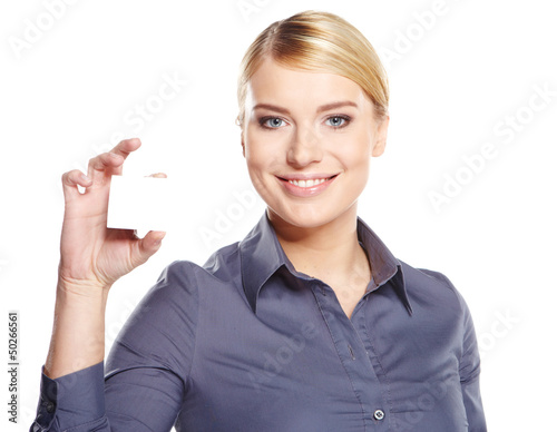 Photo: Businesswoman holding credit card. Isolated on white Businesswoman holding credit card. Isolated on white