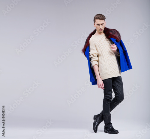 Photo: Serious slim man in natural pose Serious slim man in natural pose