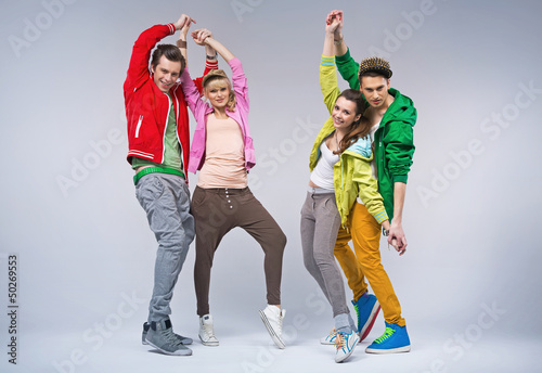 Photo: Two hip-hop style couples dancing together Two hip-hop style couples dancing together