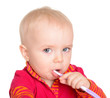 Little baby girl with toothbrush isolated on white background