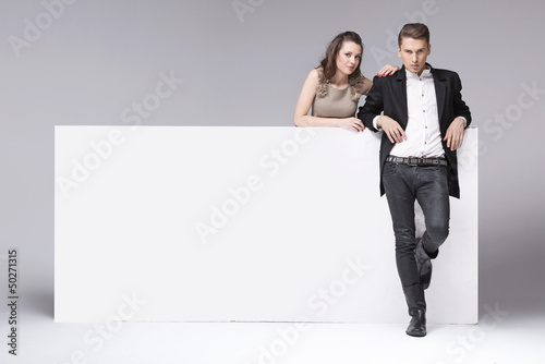 Photo: Fantastic couple relaxing in the studio Fantastic couple relaxing in the studio