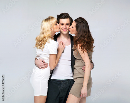 Photo: Lucky guy kissed by two fabulous women Lucky guy kissed by two fabulous women