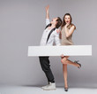 Screaming guy in funny pose with his girlfriend
