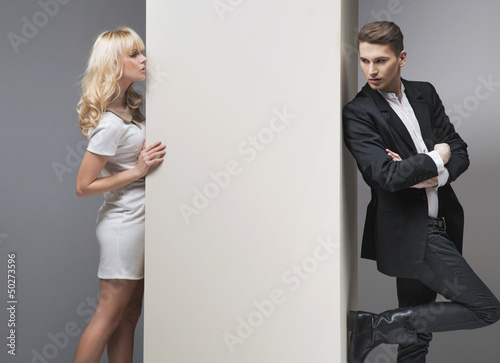 Photo: Alluring blonde woman trying to catch her boyfriend Alluring blonde woman trying to catch her boyfriend