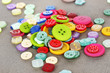 Buttons of different shapes, sizes and colors close-up