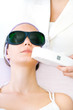 Young woman receiving laser therapy
