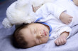 Baby and teddy bear