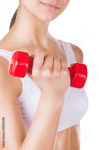 Photo: Woman with dumbbell Woman with dumbbell
