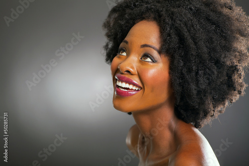 Photo: pretty black woman looking up pretty black woman looking up