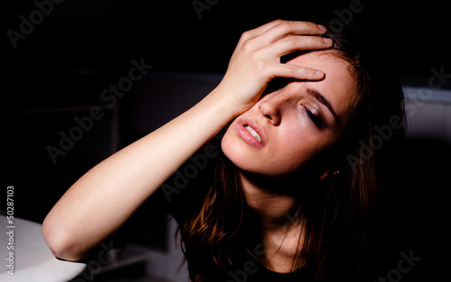 Photo: High as a kite. Young female drug addict in the bathroom. High as a kite. Young female drug addict in the bathroom.