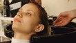 washing hair after coloring in the beauty salon