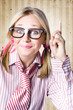 Nerd Female Salesman Pointing To Product Copyspace