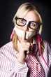 Female Business Nerd With Quiet Gesture