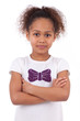 Cute little African Asian girl with folded arms