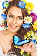 Woman with flower and  butterfly.