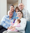  happy three generations family with two children