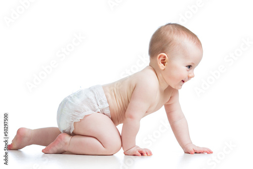 Photo: side view of pretty crawling baby side view of pretty crawling baby