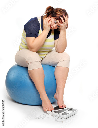 Photo: Frustrated overweight woman. Frustrated overweight woman.