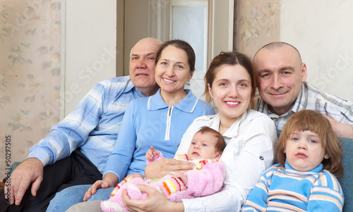 Photo: mature couple with their offspring mature couple with their offspring