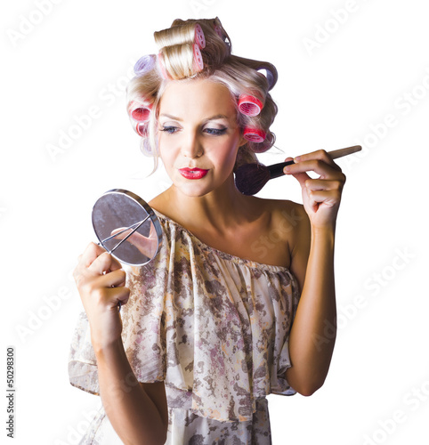Photo: Woman applying makup Woman applying makup