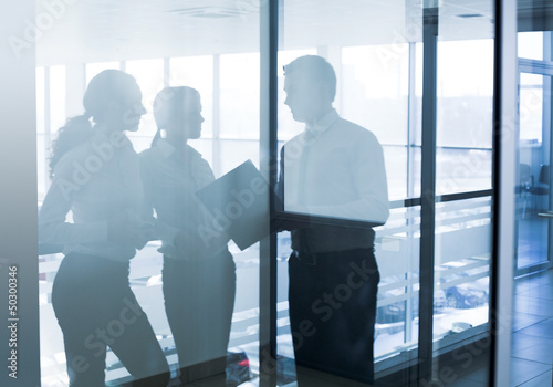 Photo: silhouettes of businesspeople silhouettes of businesspeople