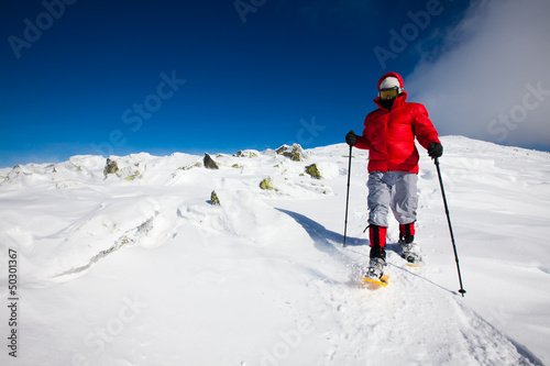 Photo: Hiker in winter mountains Hiker in winter mountains